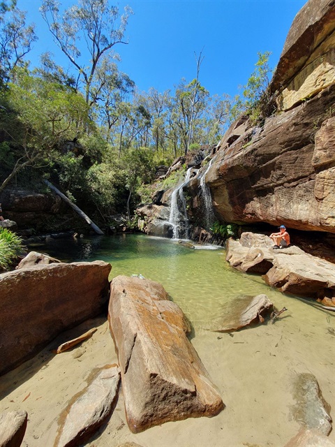 Photo of freshwater pool and waterfall